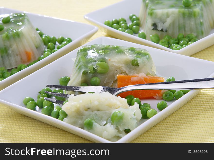 Green pea with carrot on plate