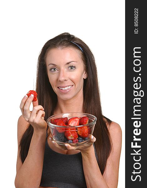 Fitness Woman Eating Fresh Fruit