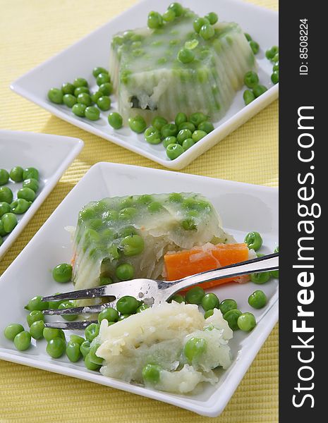 Green pea with carrot on plate