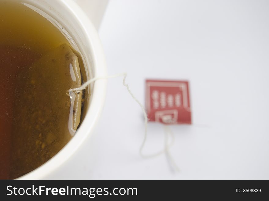 Close-up of a  white cup of tea