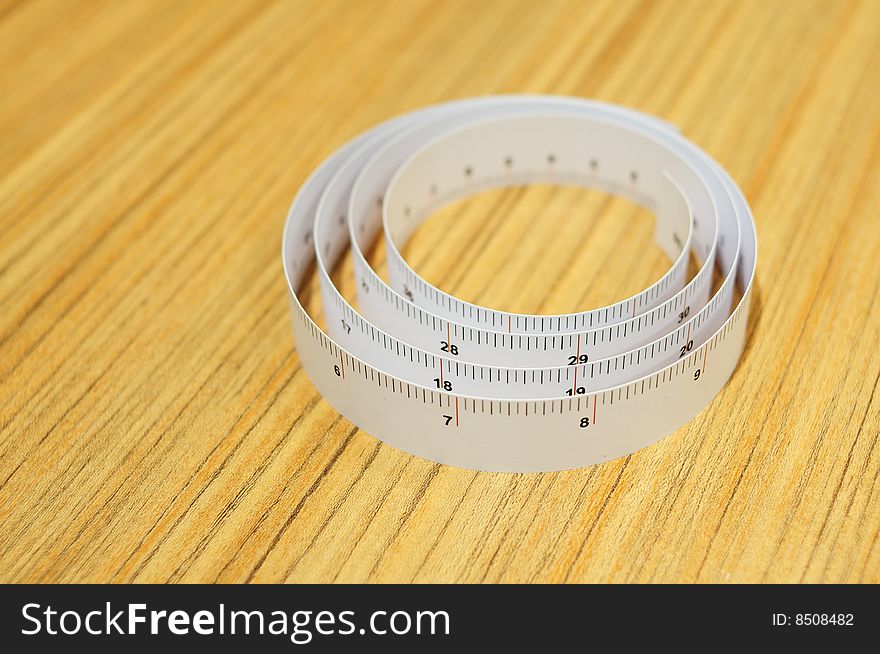 A ruler on wooden table