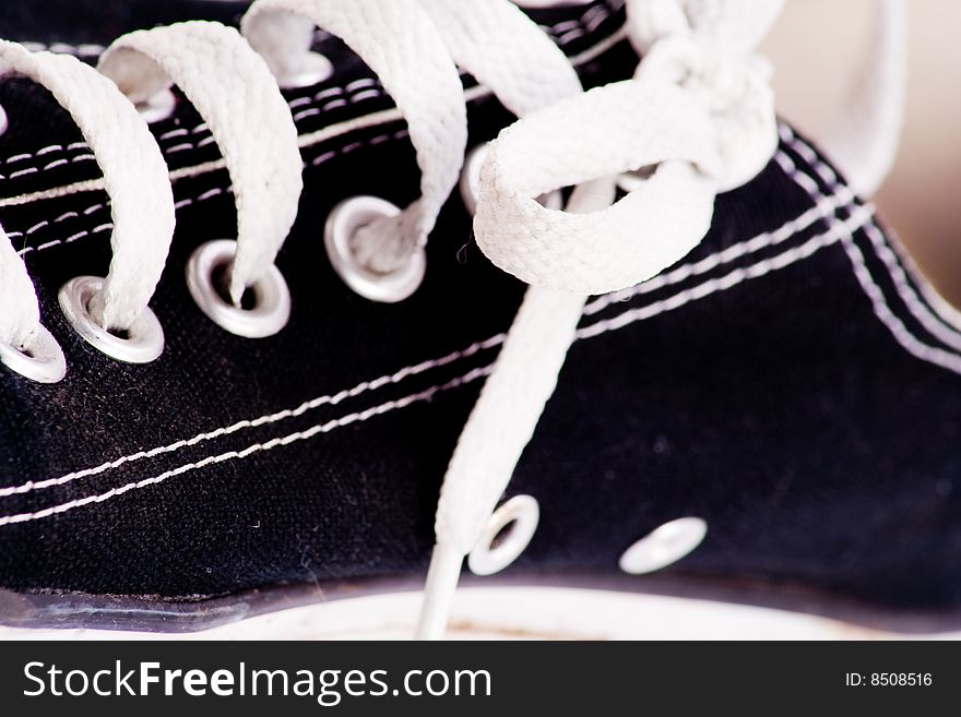 Detail of shoe laces on fashion trainers. Detail of shoe laces on fashion trainers