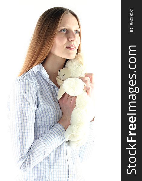 Portrait of young woman with teddy bear isolated on white backgrownd