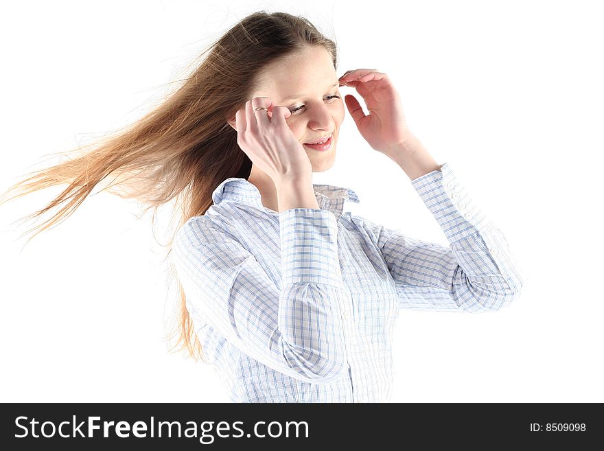 Windswept Exhilaration of young woman with long hair isolated on white backgrownd