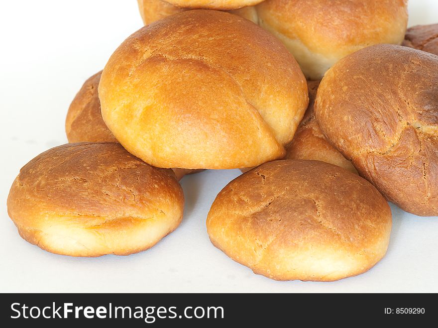 Fresh small bread on a light background. Fresh small bread on a light background