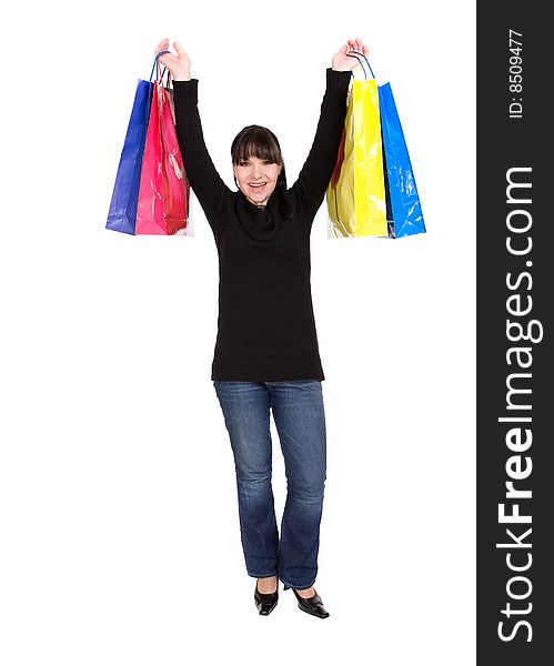 Attractive brunette woman with shopping bags