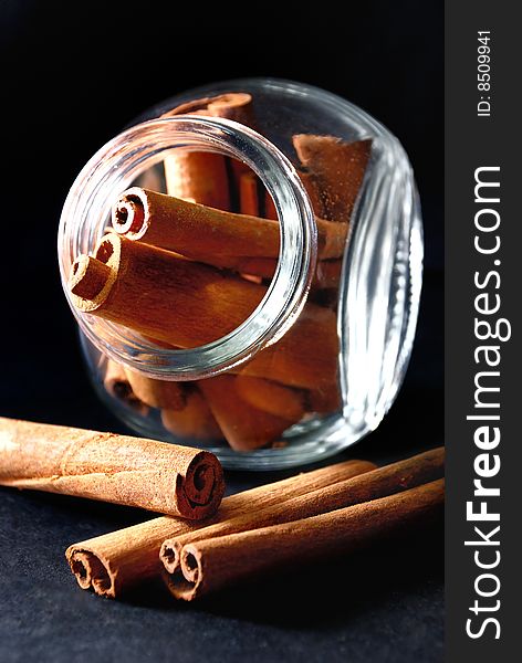 Cinnamon Stick in transparent container. Cinnamon Stick in transparent container