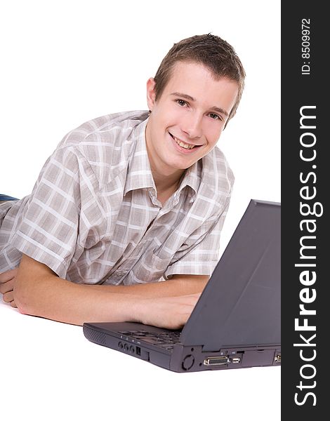 Casual teenager with laptop. over white background. Casual teenager with laptop. over white background