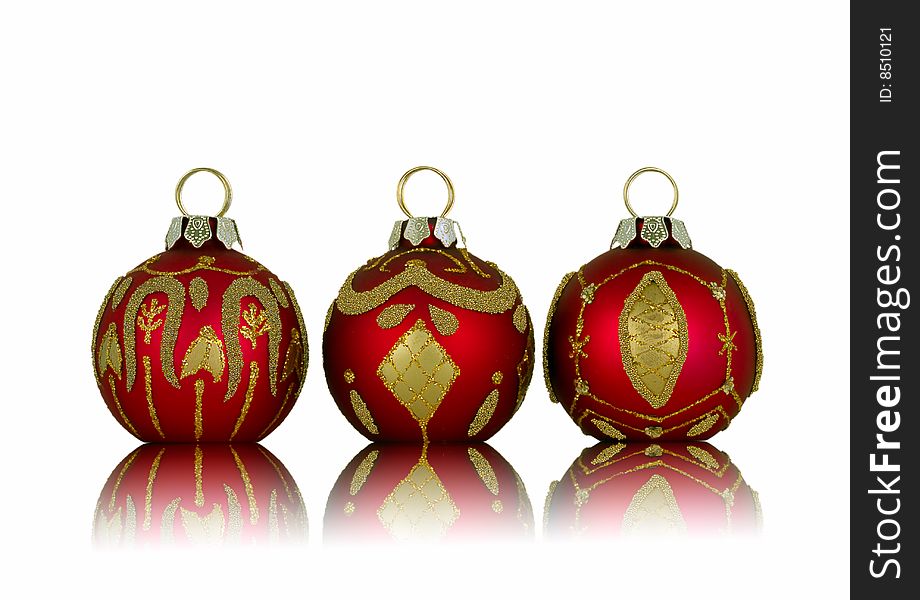 Christmas balls with mirrored reflections against white background