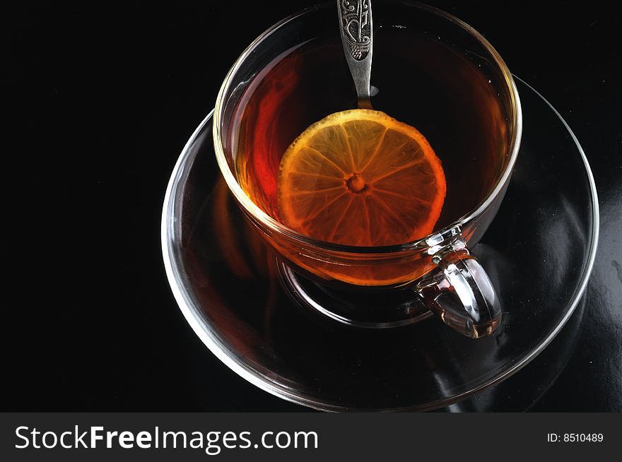 Glass Cup Of Tea With Lemon