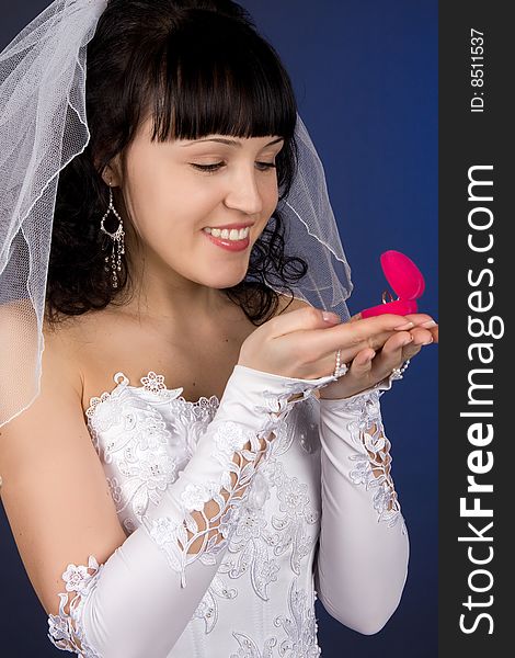 Beautiful Bride Looking At Wedding Ring