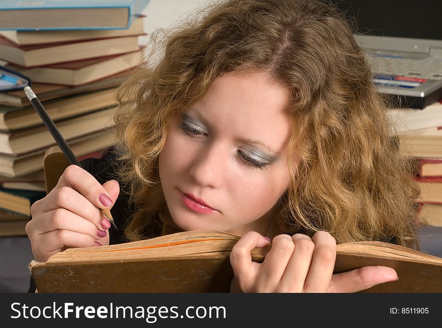 The young woman prepares for examinations. The young woman prepares for examinations.