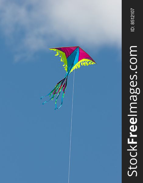 Colored kite in blue sky. Colored kite in blue sky