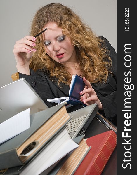 The young woman prepares for examinations. The young woman prepares for examinations.