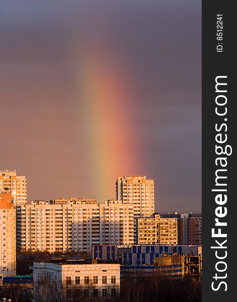 Big rainbow above city buildings. Big rainbow above city buildings