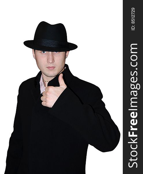 The gentleman in a hat and in a coat on a white background