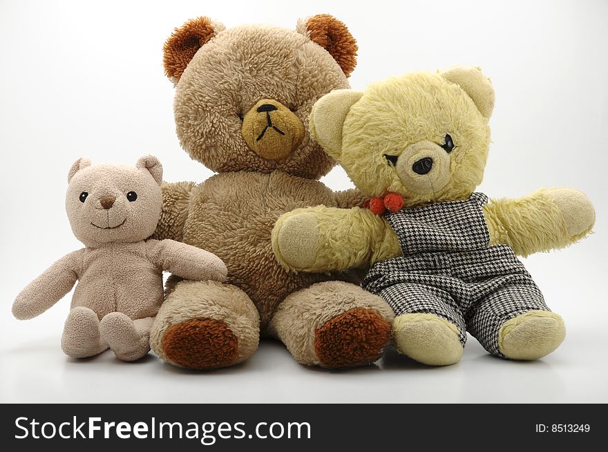 Three teddy bears against white background. Three teddy bears against white background