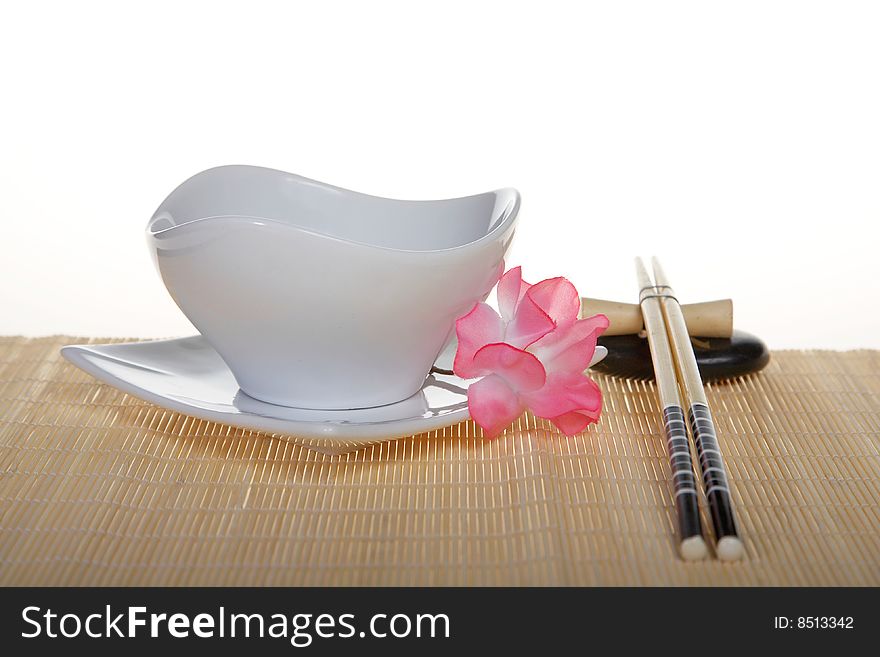 Sushi Place Setting: plate with chopsticks and flower. Sushi Place Setting: plate with chopsticks and flower