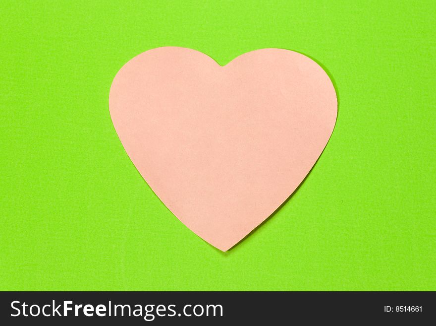 Heart made of pink paper as background. Heart made of pink paper as background