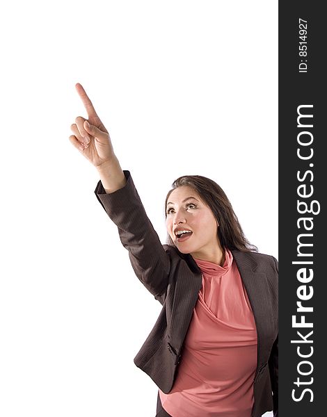 A pretty asian woman points upward in front of a white background. A pretty asian woman points upward in front of a white background