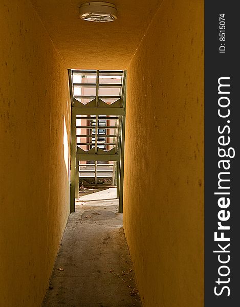 Passageway under the stairs, with stucco finish. Passageway under the stairs, with stucco finish.