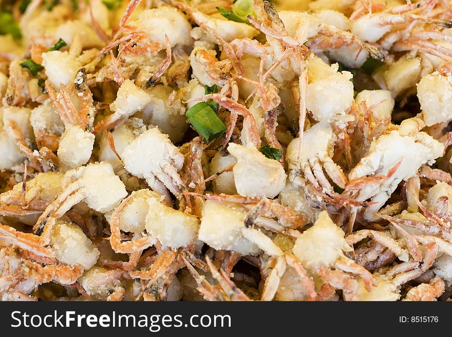 Cooked baby crabs.  Cooked with spring onions and salt.  This makes them slightly crunchy.