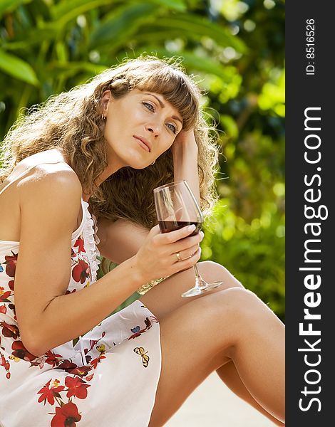 Portrait of young attractive woman having good time in tropic environment. Portrait of young attractive woman having good time in tropic environment