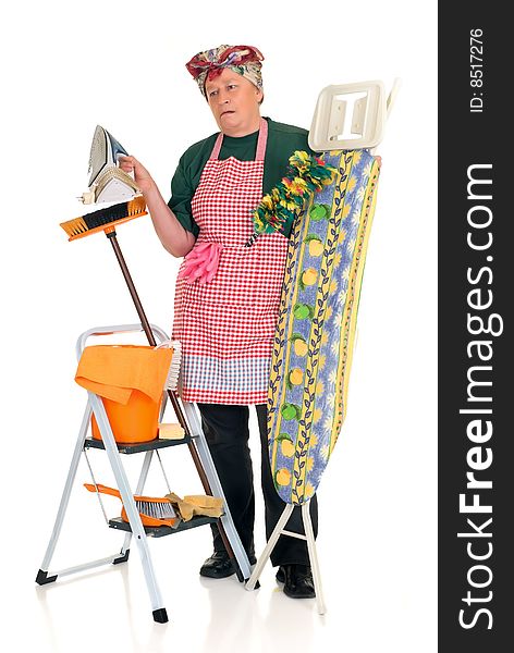 Middle-aged housewife with ironing-board and ladder with cleaning products for daily household. Middle-aged housewife with ironing-board and ladder with cleaning products for daily household.