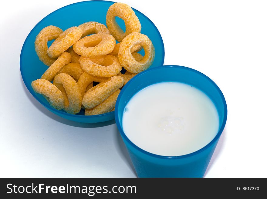 Corn Flakes and milk on the white background