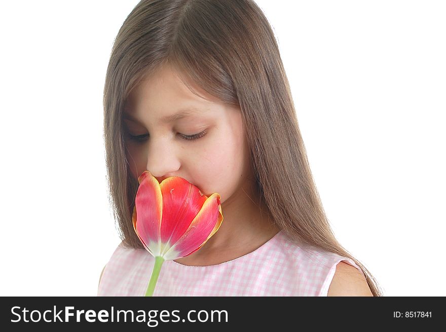 The portrait of little cute girl with flower
