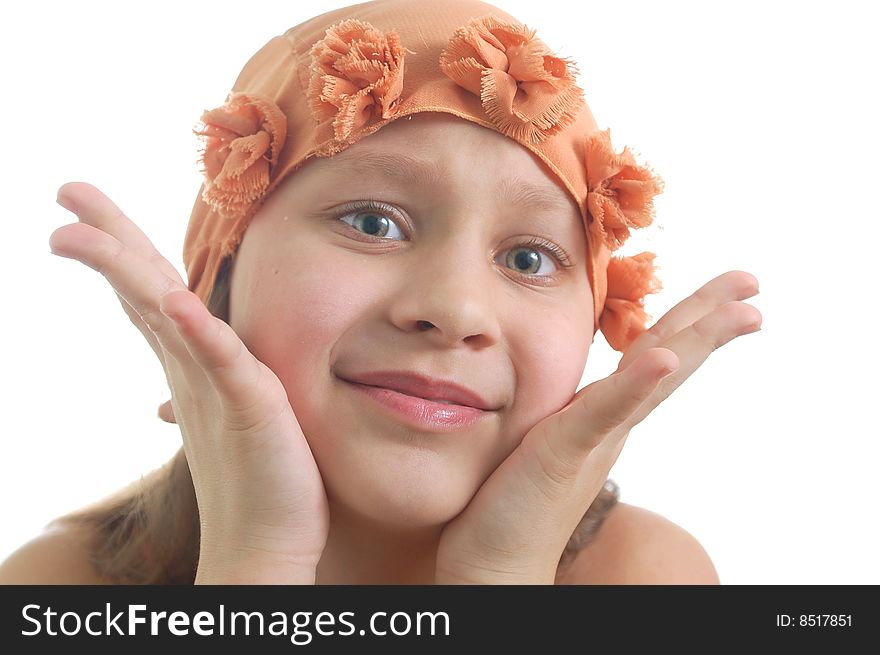 The face of  happy little  girl close-up. The face of  happy little  girl close-up