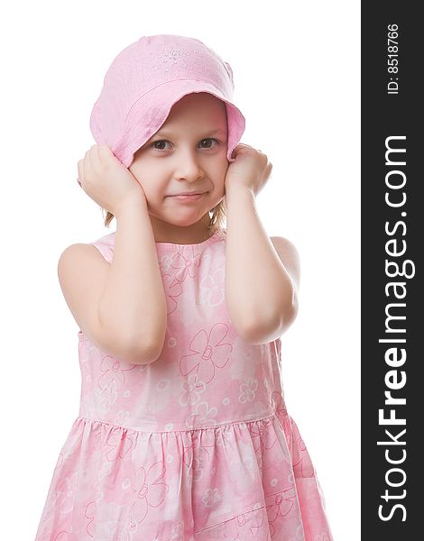 Girl in a pink dress and a hat isolated on a white background. Girl in a pink dress and a hat isolated on a white background