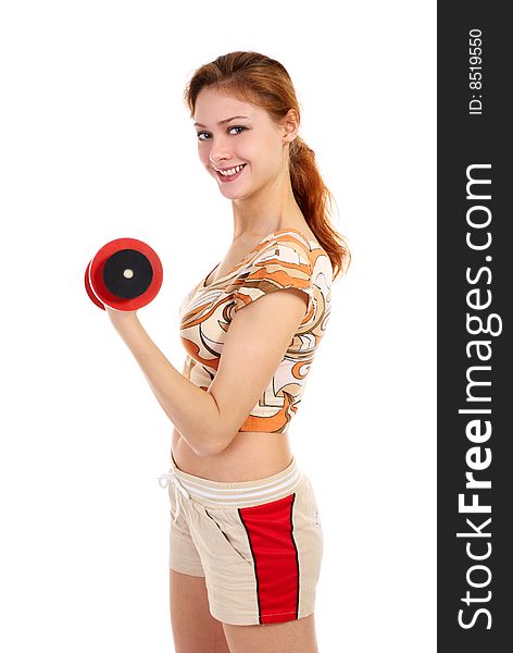 Young beautiful woman with dumbbell. Isolated over white background.