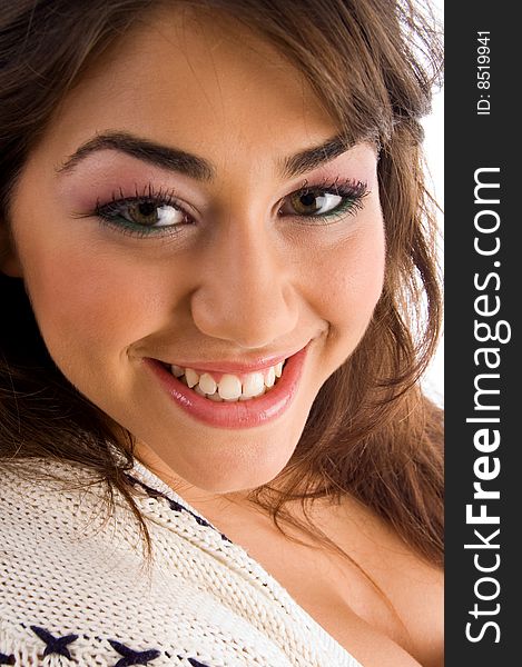 Smiling female looking at camera on an isolated background