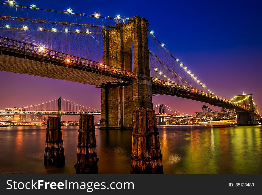 Brooklyn Bridge in New York City at night.