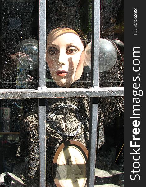 antique-store window woman