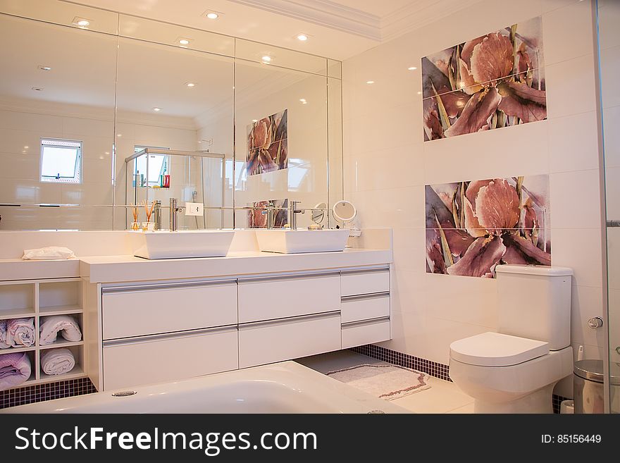 Interior of contemporary modern bathroom vanity and mirror. Interior of contemporary modern bathroom vanity and mirror.