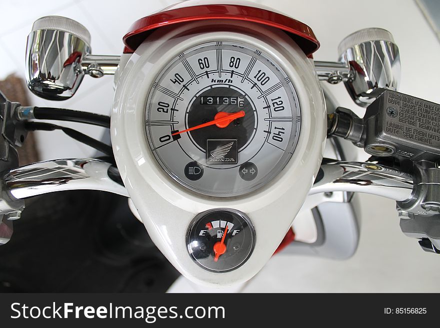 White And Red Motorcycle Gauge