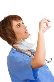 Caucasian Female Doctor Checking Syringe Stock Photos Caucasian Female Doctor Checking Syringe Stock Photos
