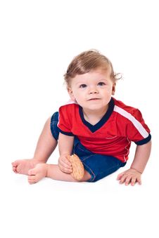 Curious Baby Crawls With Cookies In Hand Stock Photo Curious Baby Crawls With Cookies In Hand Stock Photo