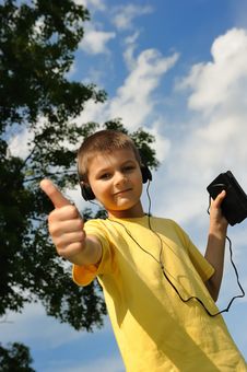 Boy Listens To Music Royalty Free Stock Photography Boy Listens To Music Royalty Free Stock Photography