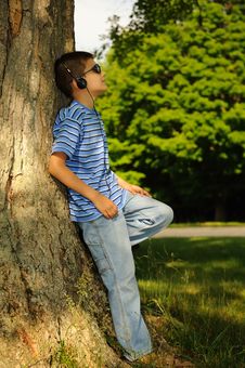 Boy Listens To Music Stock Images Boy Listens To Music Stock Images