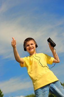 Boy Listens To Music Stock Photo Boy Listens To Music Stock Photo
