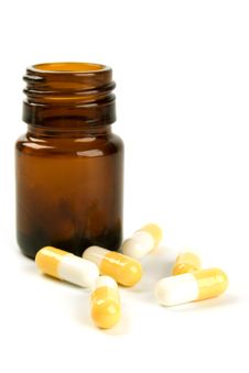 Glass Bottle With Yelllow Capsules Stock Photography Glass Bottle With Yelllow Capsules Stock Photography