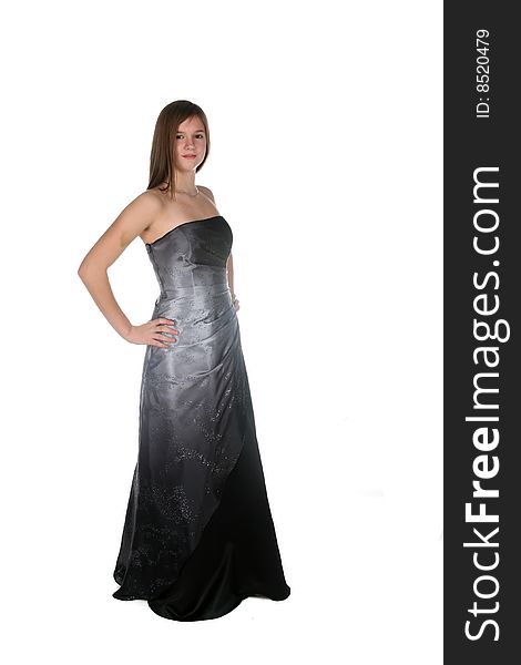 Beautiful teenage girl in floor length glittery silver gown. Beautiful teenage girl in floor length glittery silver gown