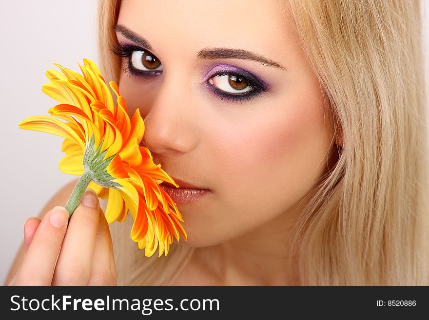 Young fashion woman with gerbera. Young fashion woman with gerbera