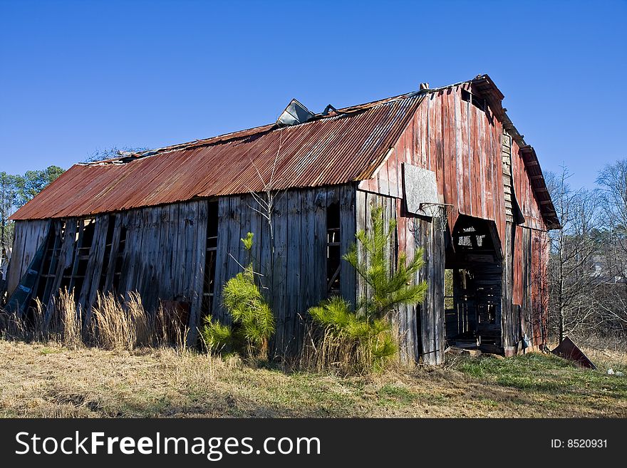 Old Barn With Rusty Roof