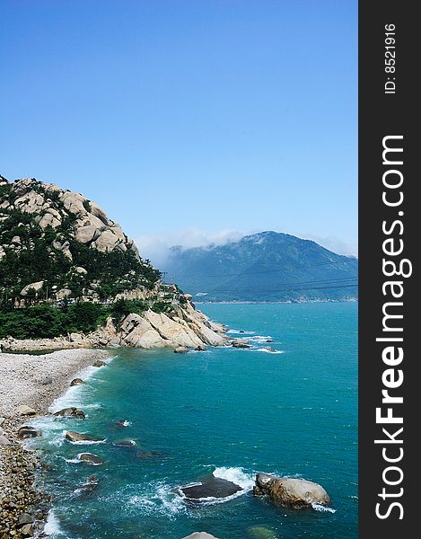 Beautiful seaside moutians under blue sky. Beautiful seaside moutians under blue sky