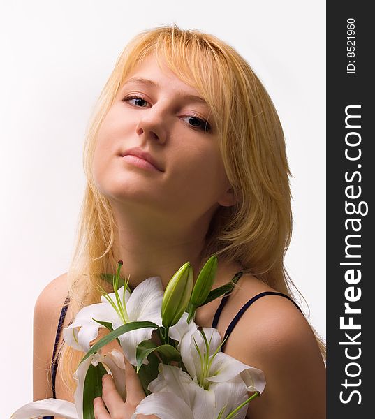 Beautiful Young Woman With Lily Flower