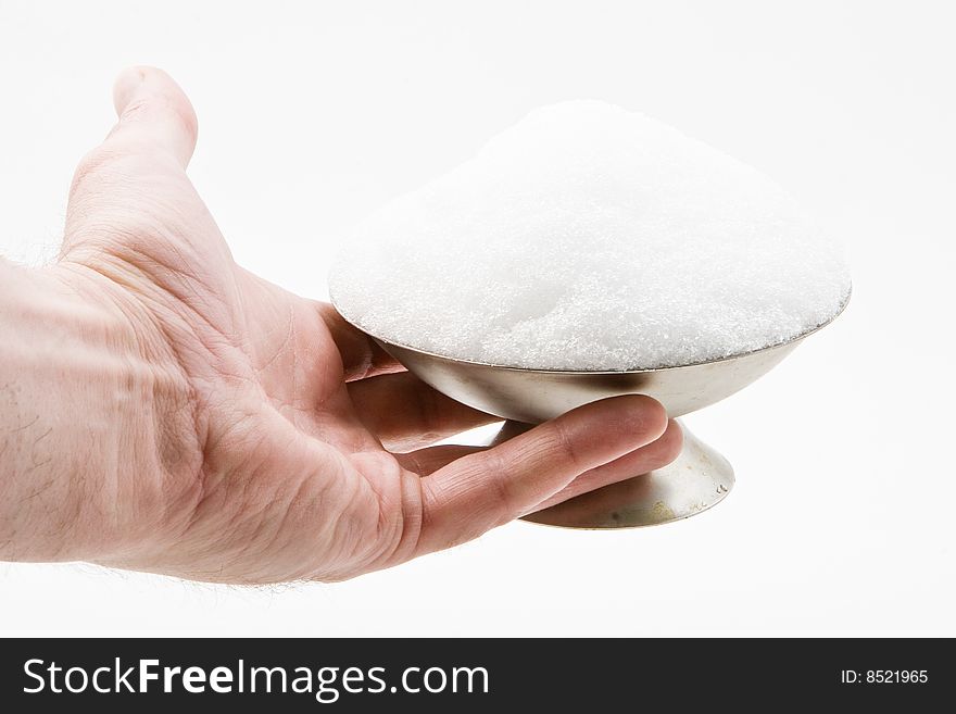 Snow in a cup for ice-cream on a white background. Snow in a cup for ice-cream on a white background